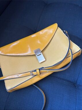 Melie Bianco Yellow Crossbody Clutch with Silver Hardware